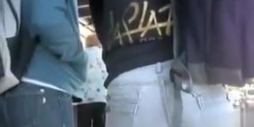 Beautiful young lady with a huge ass is wearing tight jeans