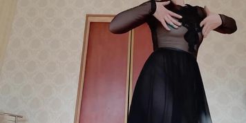 Russian beauty exudes dancing in sheer black chiffon long nightgown
