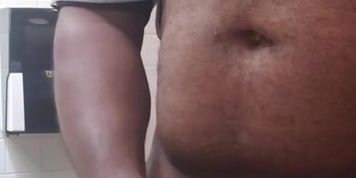 Jacking off in a public rest room (Jackie Brown)
