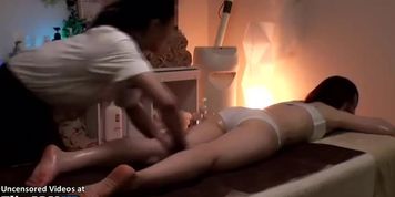 Beautiful girl enjoys hot massage