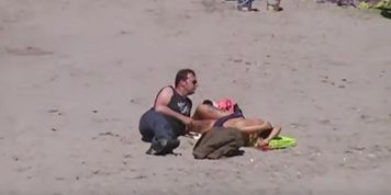 German milf on french beach spy. Shaky quality.