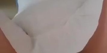 Hot bitch shows her small boobs with erected nipples and her dark pussy becomes wet
