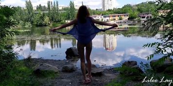 Walking naked along the river bank.
