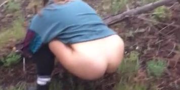 Thick bitch pissing outside