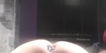 Plugged femboy pounds onahole