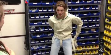 Amateur girl escapes from straitjacket