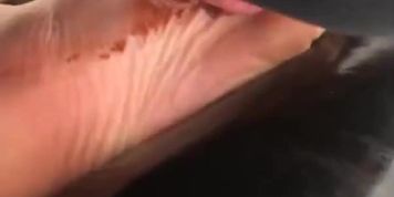 Persian girl feet chocolate licking