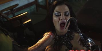 Busty vampire babe pounded on table