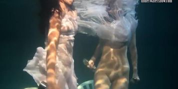 Polcharova and Siskina wet horny underwater lesbians