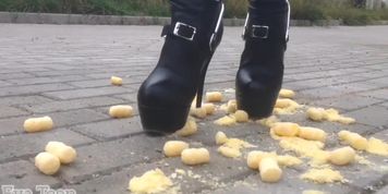 Knee high leather boots and spurs making dinner (Gina Carano)