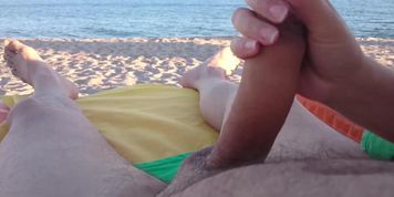 Handjob at the beach revisited