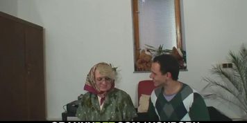 Shaved pussy grandma pleases young boy
