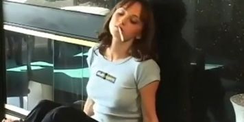 Amazing young brunette beauty smoking sexy