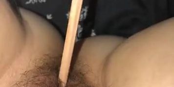 Girl shoved pencil up her pussy