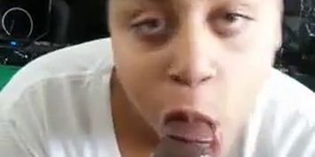 A mixed chick suckin' cock