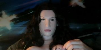 Relaxing in female mask Anine after all that masking! (RubberDoll)