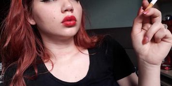 Angry redhead smoking