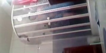 Cute busty teen caught showering on hidden cam