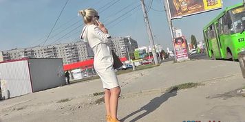 Upskirt mov of blonde cougar's bubble butt