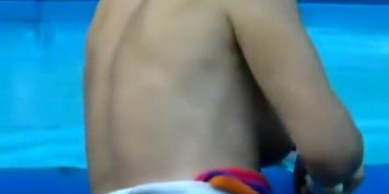 Peeping a topless neighbor cleaning pool