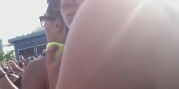 Party girl bounces to the music