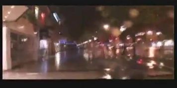 Amandine walks down the Champs Elysees