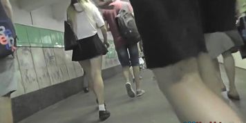 Upskirt footage of g-string of a girl in mini skirt