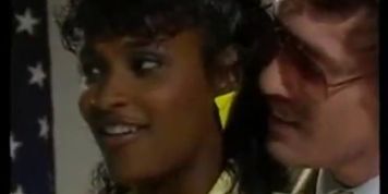 John Holmes fucks a sweet black pussy (Mia D Coccinelle)