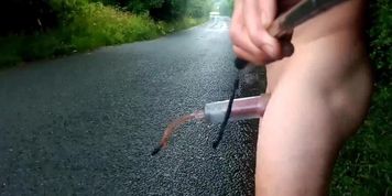 Naked walk in bushes and on road ball weights and penis pump 