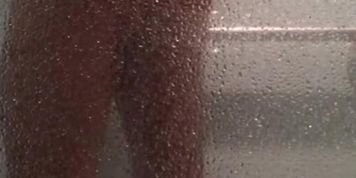 Uncut Latino playing with ass and dick in shower