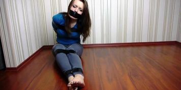 Girl tied up and not going anywhere