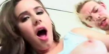 A very pretty young brunette with a hard man