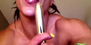 Muscle MILF with big biceps and huge pierced clitoris