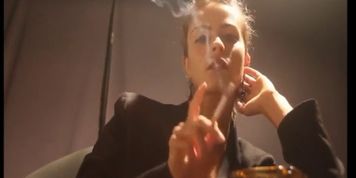 Gorgeous brunette girl smoking sexy