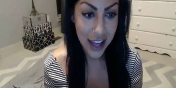 Busty beauty playing with her ass on a webcam