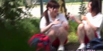 Japanese lesbian babes kiss and lick each other