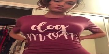 Sexy big boobed girl in a dog mother t-shirt