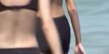 Candid girl wearing swimsuit with bra and black shorts 07e