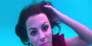 Brunette Undewater Breath Hold in Formal Wear & Striptease