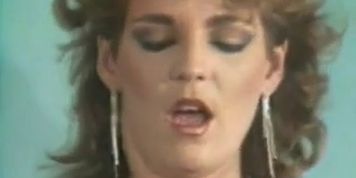 Erica gets her pooper probed by Christy (Christy Canyon, Erica Boyer)