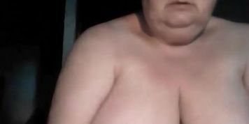 Fat mature BBW plays with hairy pussy