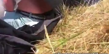 Youthful woman showing darksome strap at air show