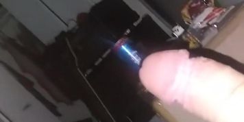 Alone in my room laying down. Watching girl squirting porn. Stroking my dic