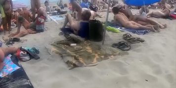 Group of French nudists have some kinky fun at a beach of Cap d'Agde