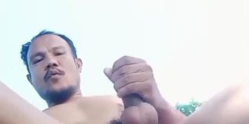 Thai daddy jerk off outdor