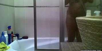 Curvy indian stepmom spied in the shower