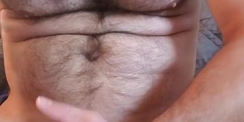 Muscle bear flexes, spits on dick and then shoots a thick cumshot!