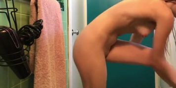 Girl caught applying lotion and changing by cam in her bathroom