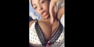 Ebony laying down w big titties