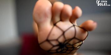 Fishnet tights foot show